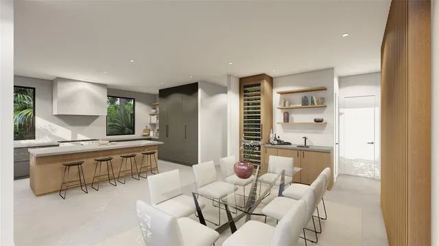 a kitchen with stainless steel appliances kitchen island granite countertop a sink and cabinets