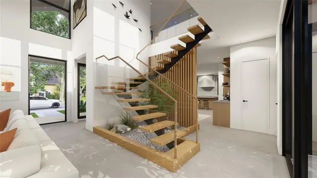 a view of entryway livingroom and hall with wooden floor
