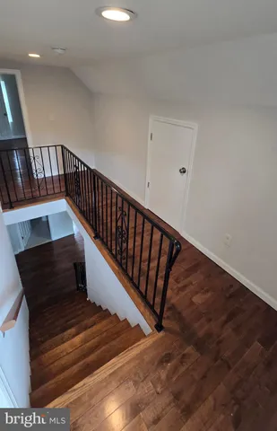 a view of entryway with wooden floor