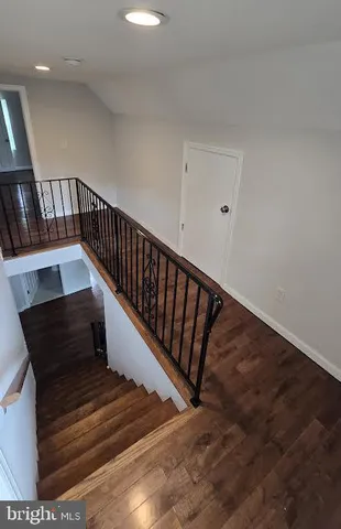 a view of entryway with wooden floor