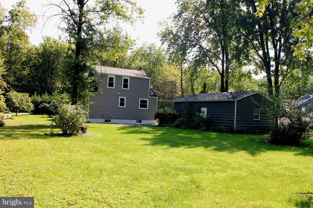 a view of a couches in the backyard of house