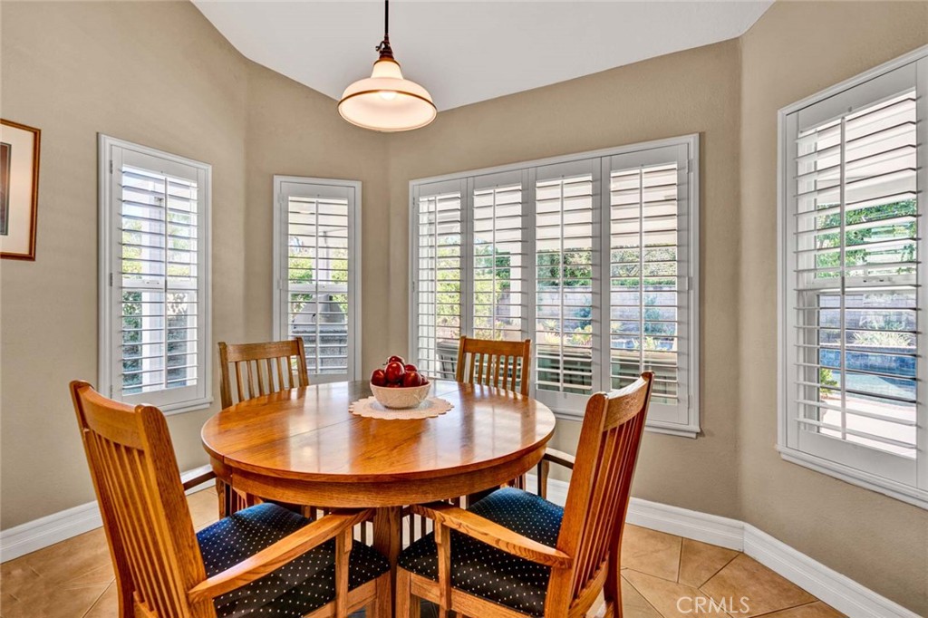 7710 East Strawberry Ridge Orange, CA 92869 - Photo 15 of 33 Multiple windows brighten the informal dining area.