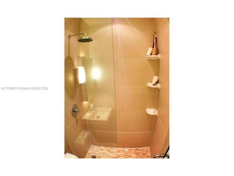 727 Jefferson Avenue, Unit 3 Miami Beach, FL 33139 - Photo 19 of 25 a bathroom with a shower