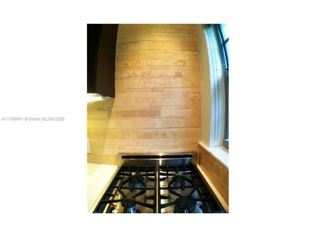 a bathroom with a sink and a shower