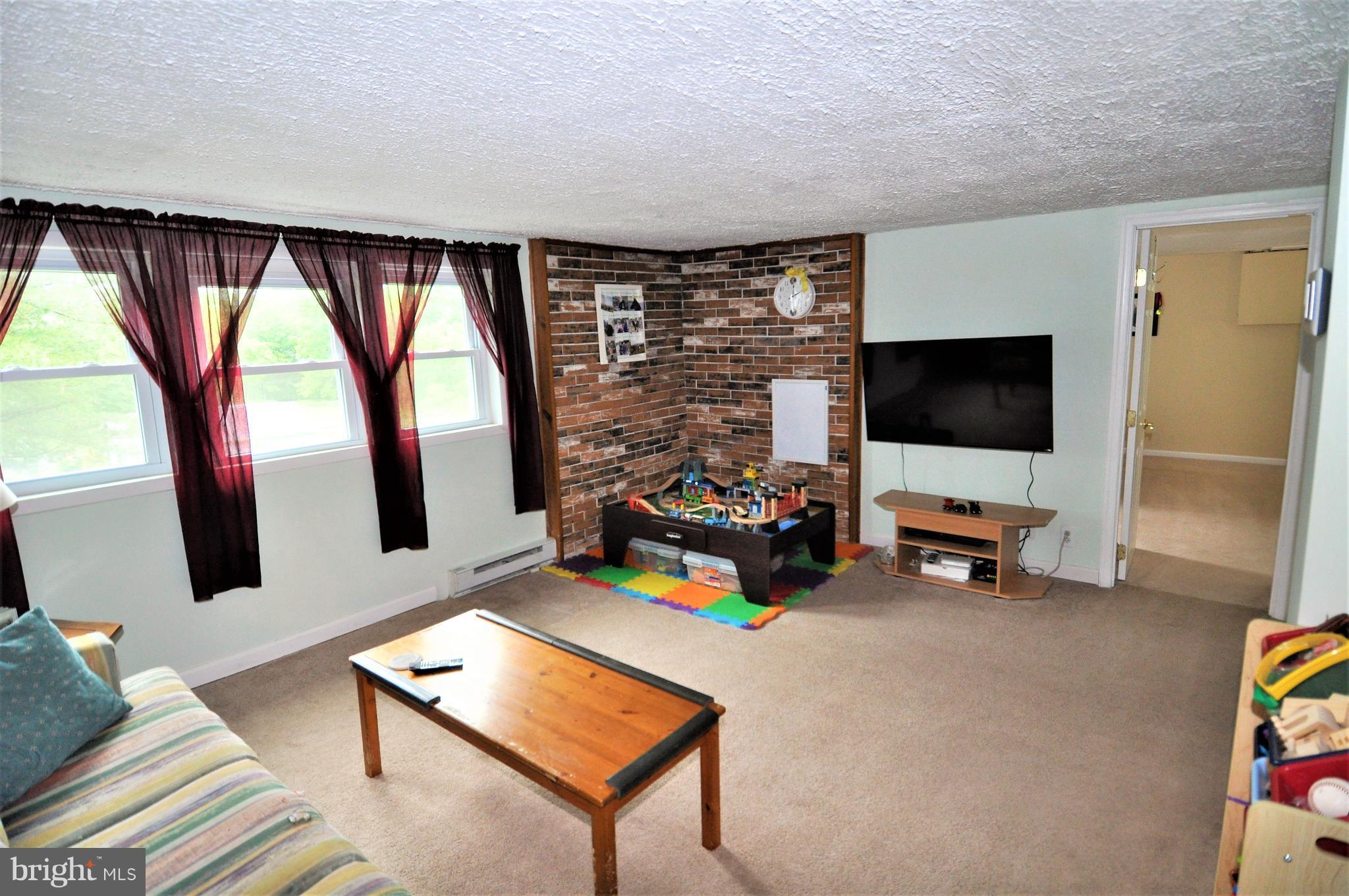 1347 Quaker Church Road Street, MD 21154 - Photo 9 of 28 Family Room Has Additional Hook-Up for Woodstove