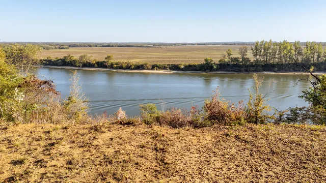 a view of a lake with a city