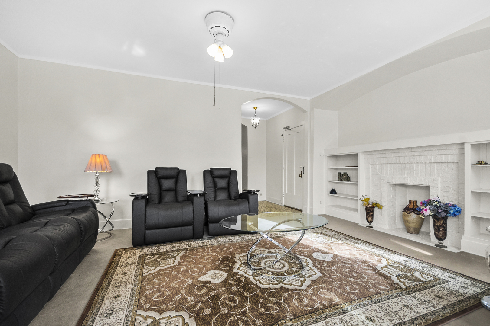 1244 West Arthur Avenue, Unit 2 Chicago, IL 60626 - Photo 5 of 25 a bed room with furniture and a wooden floor