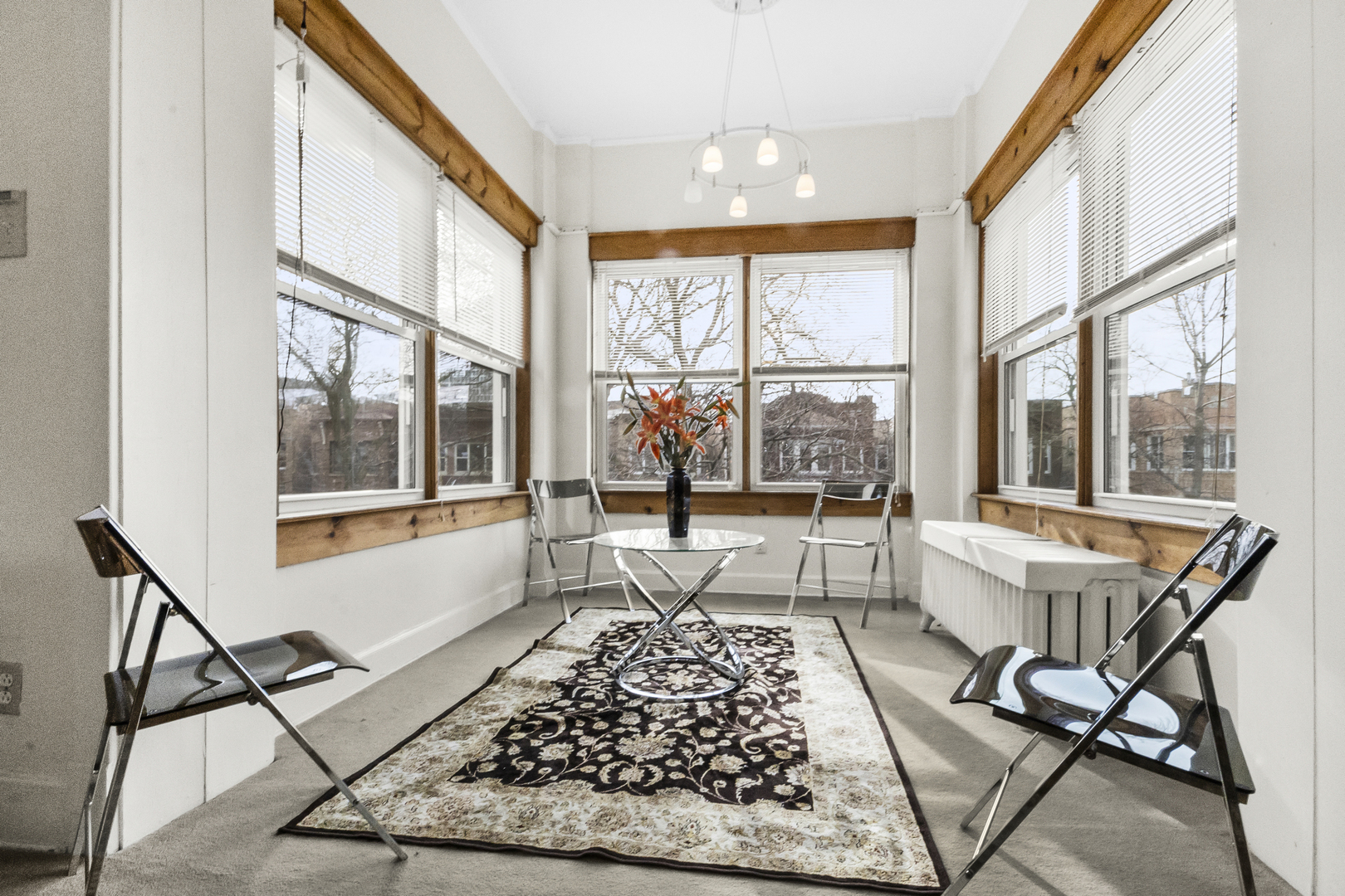 1244 West Arthur Avenue, Unit 2 Chicago, IL 60626 - Photo 6 of 25 a living room with a large window