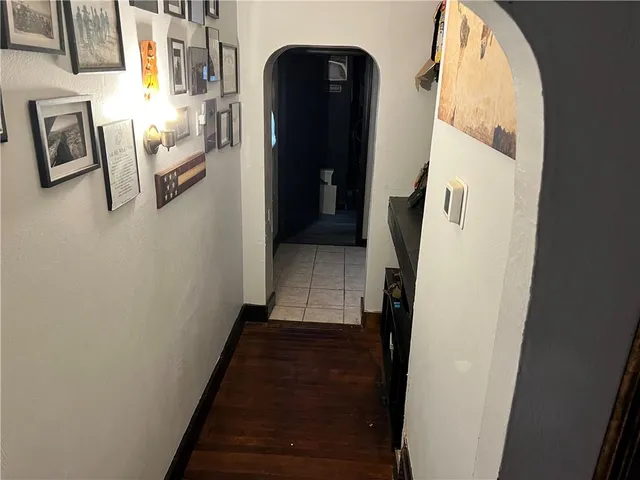 a view of entryway with wooden floor