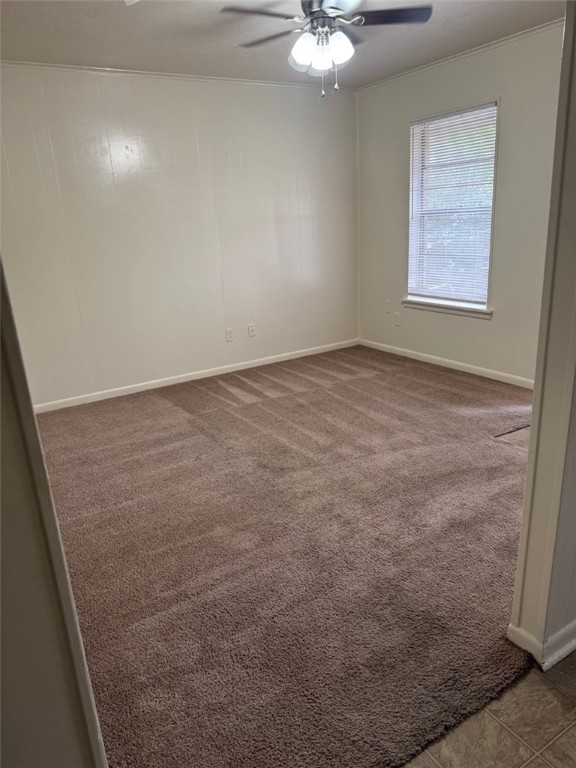 3180 Cain Road, Unit 170 College Station, TX 77845 - Photo 8 of 8 an empty room with a chandelier fan and windows