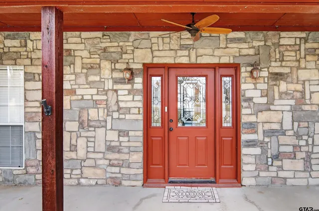 a view of a brick house with windows