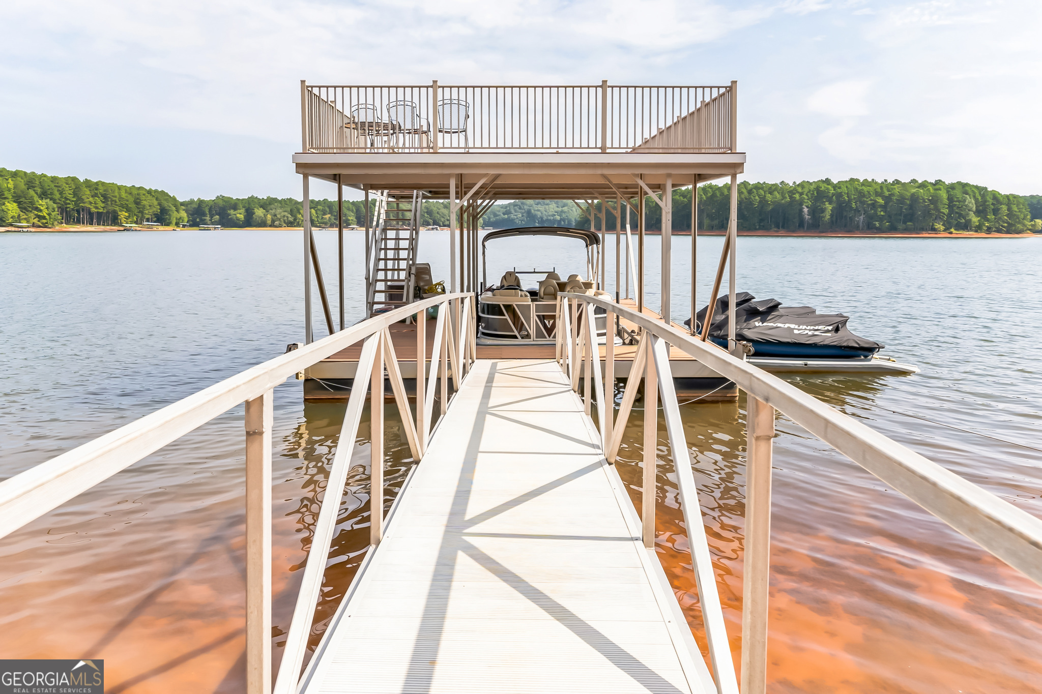 455 Chase Landing Martin, GA 30557 - Photo 16 of 37 a view of a balcony with two chairs