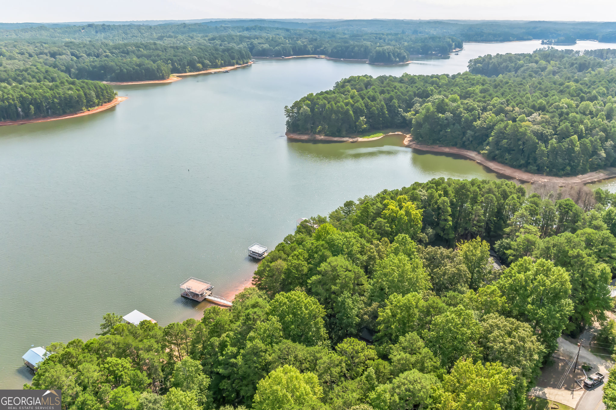 455 Chase Landing Martin, GA 30557 - Photo 27 of 37 an aerial view of a house with a yard and lake view