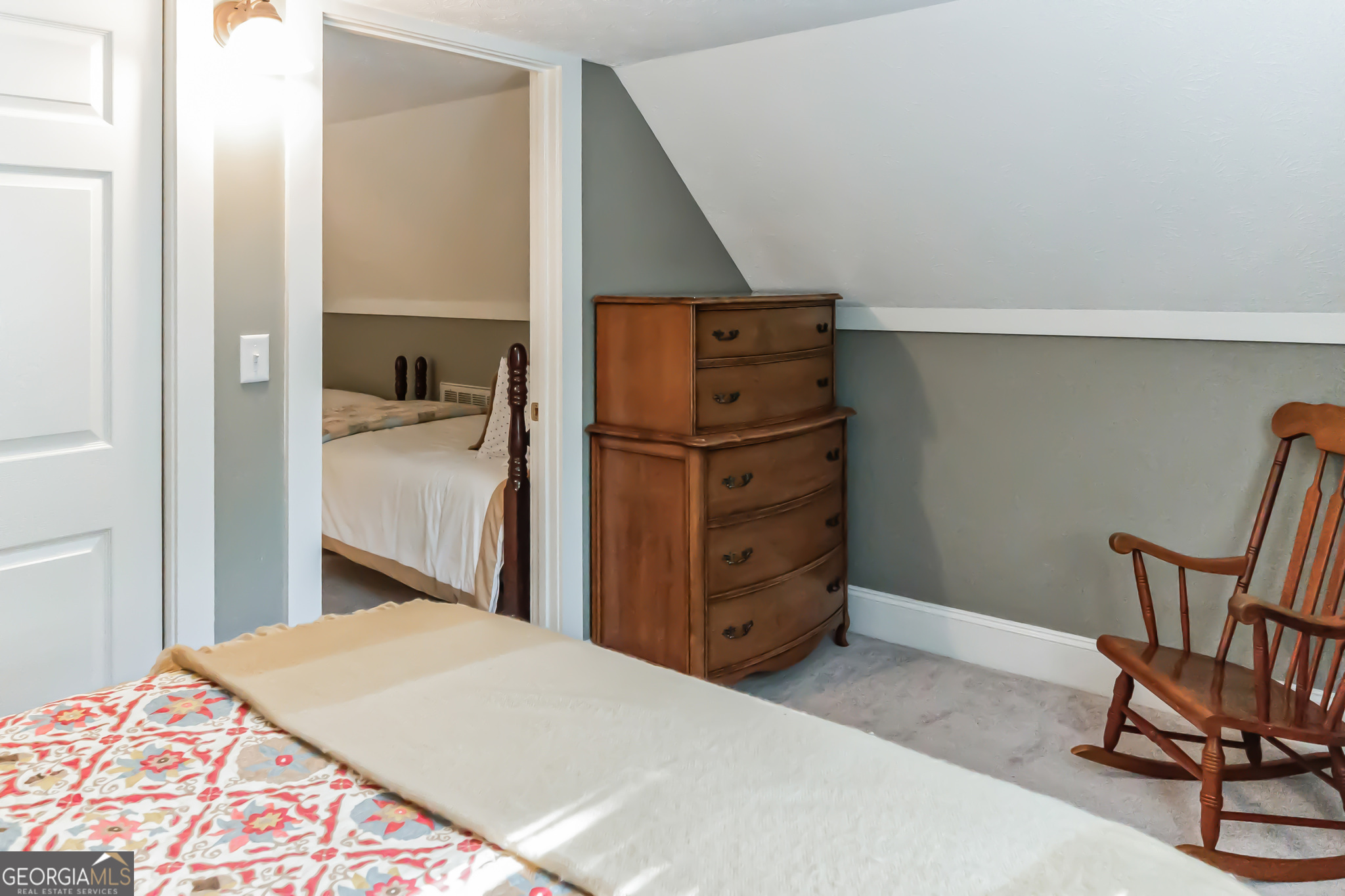 455 Chase Landing Martin, GA 30557 - Photo 31 of 37 a bedroom with a bed and chair