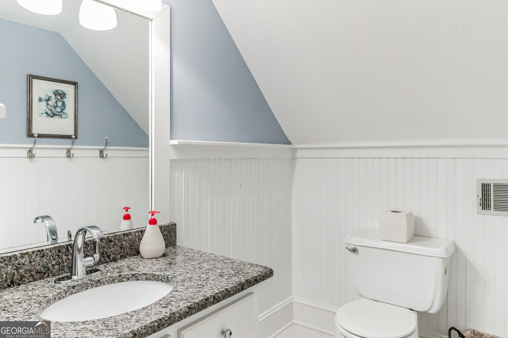 455 Chase Landing Martin, GA 30557 - Photo 36 of 37 a bathroom with a granite countertop sink a toilet and a mirror