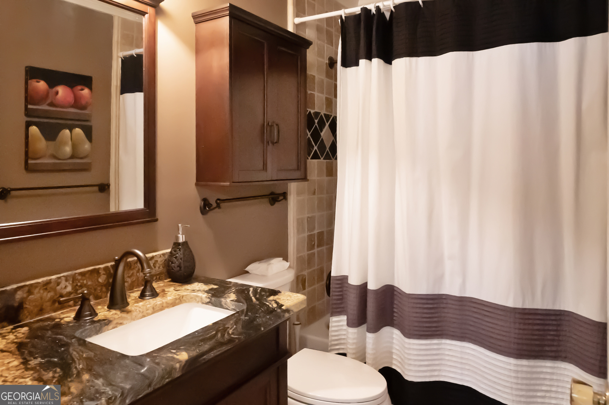 455 Chase Landing Martin, GA 30557 - Photo 37 of 37 a bathroom with a sink and a mirror