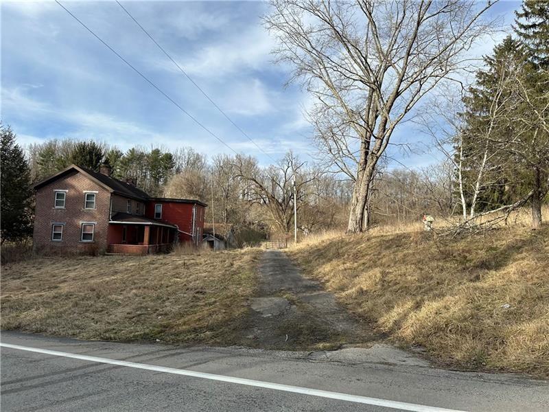 286 Dally Road Coal Center, PA 15423 - Photo 4 of 16 a view of a house with a yard