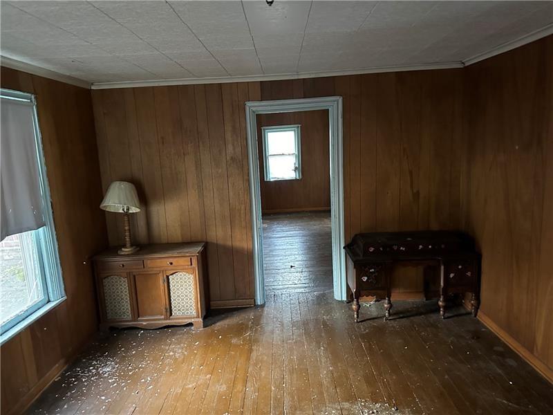 286 Dally Road Coal Center, PA 15423 - Photo 5 of 16 an empty room with wooden floor and windows
