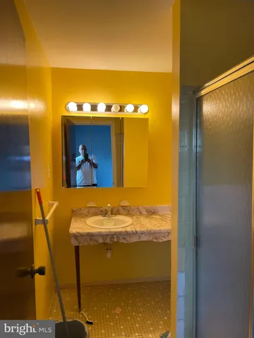 a view of a bathroom with a swimming pool