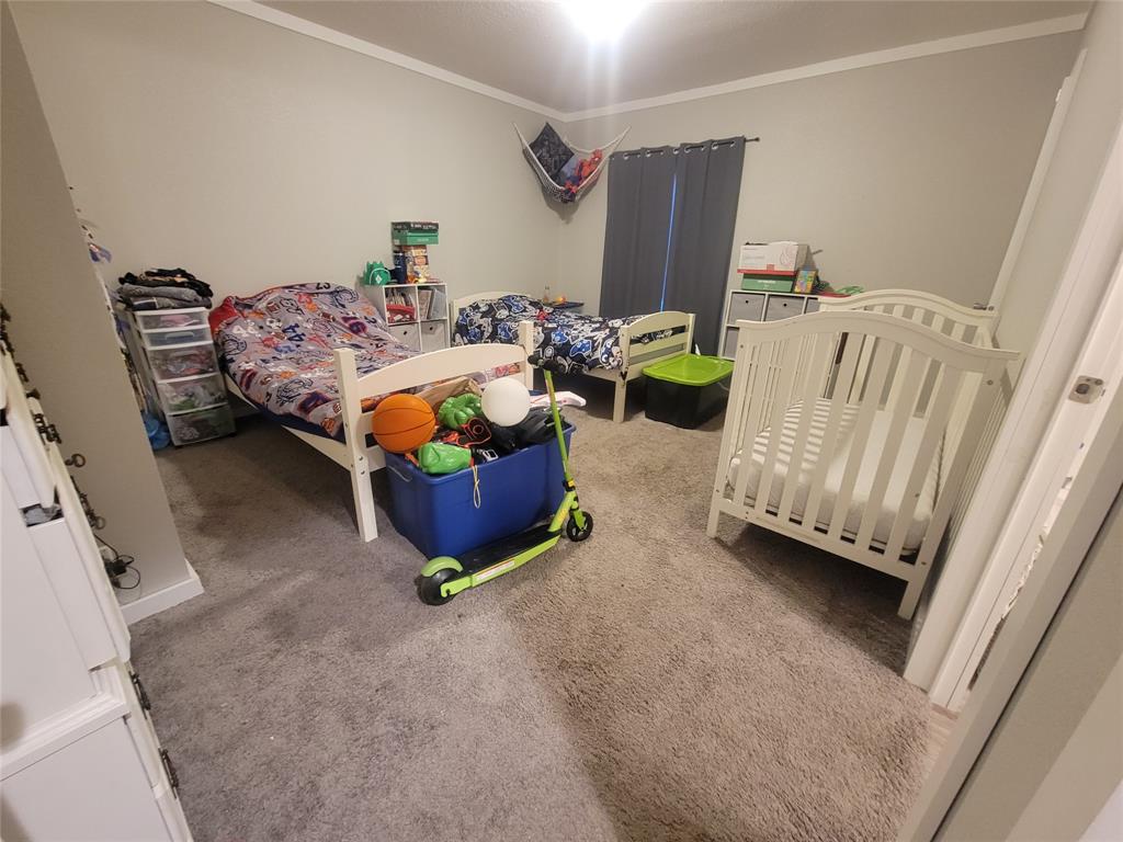 150 Hawkins Chapel Road Loving, TX 76460 - Photo 34 of 40 a living room with furniture and a couch