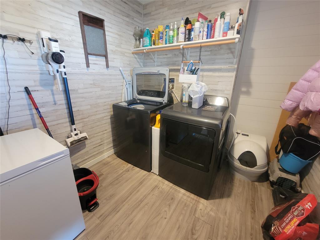 150 Hawkins Chapel Road Loving, TX 76460 - Photo 39 of 40 a room with a storage and utility