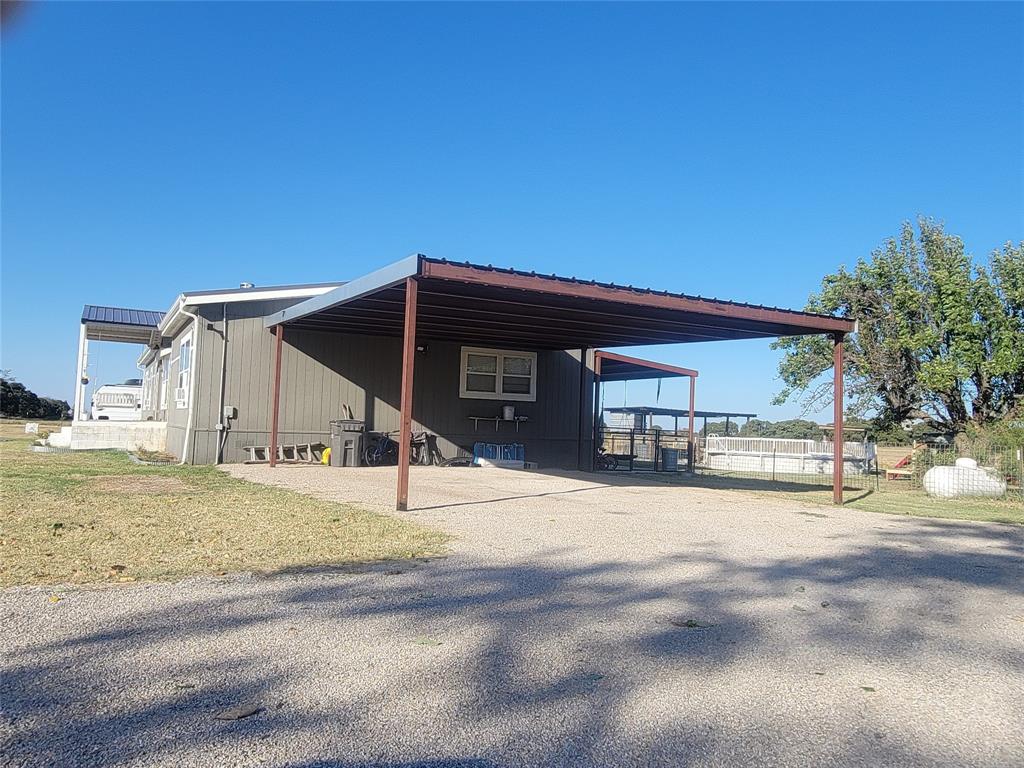 150 Hawkins Chapel Road Loving, TX 76460 - Photo 4 of 40 a house with a outdoor space