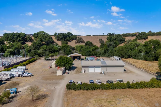 an aerial view of a house with a garden