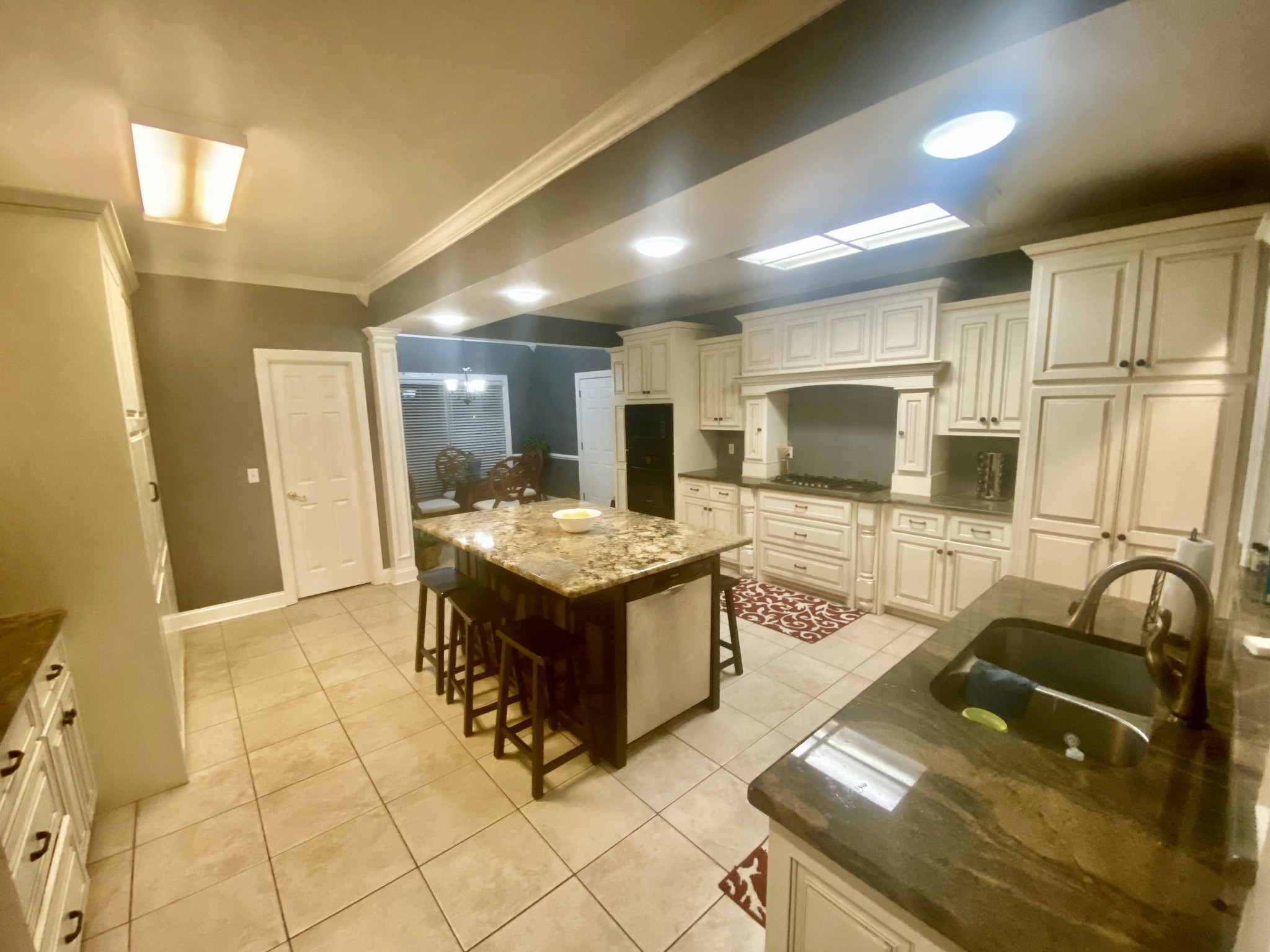 331 Duck River Road Manchester, TN 37355 - Photo 4 of 26 a view of a kitchen with stainless steel appliances granite countertop a sink and a refrigerator