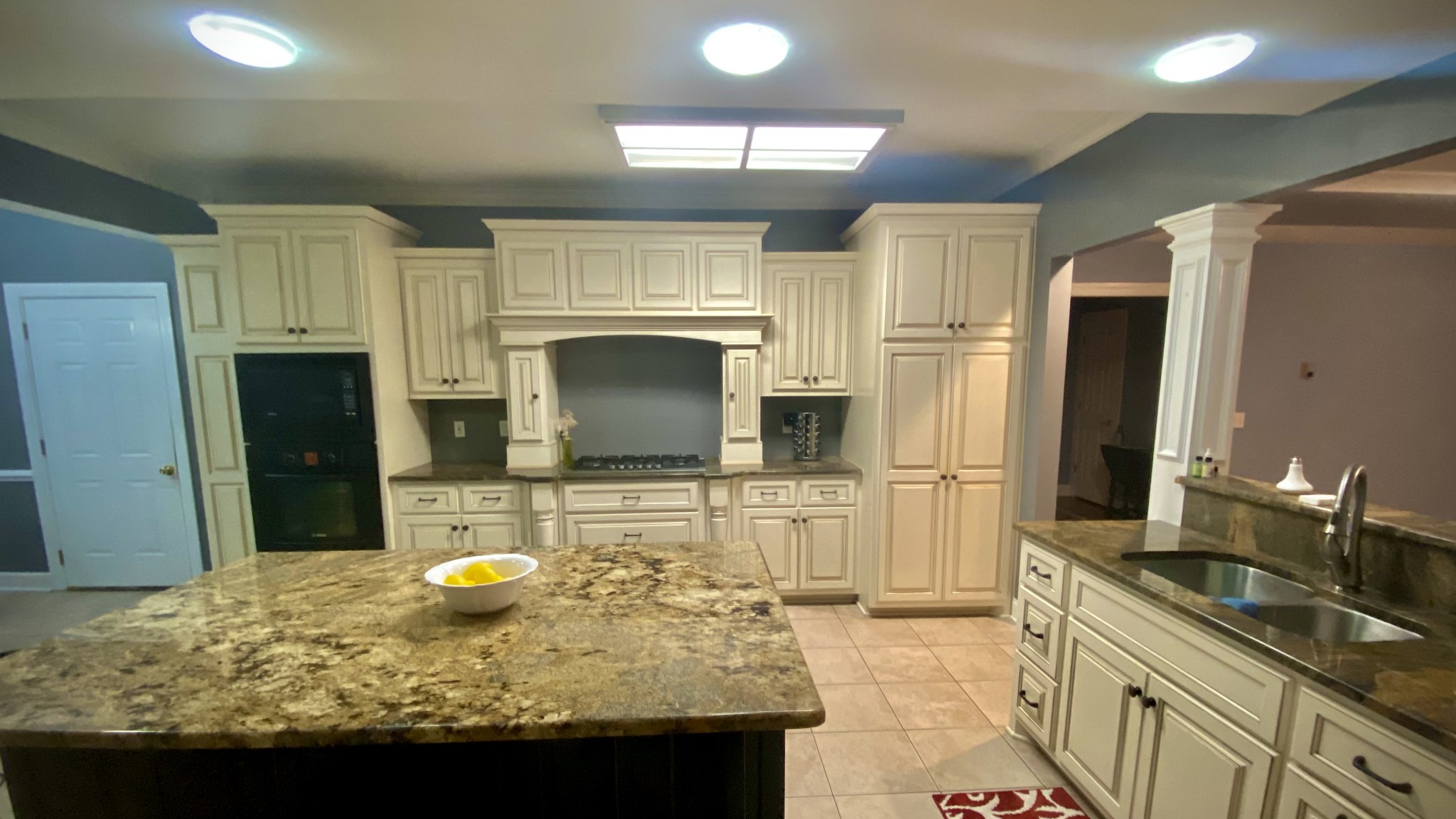 331 Duck River Road Manchester, TN 37355 - Photo 6 of 26 a kitchen with a sink a stove and refrigerator