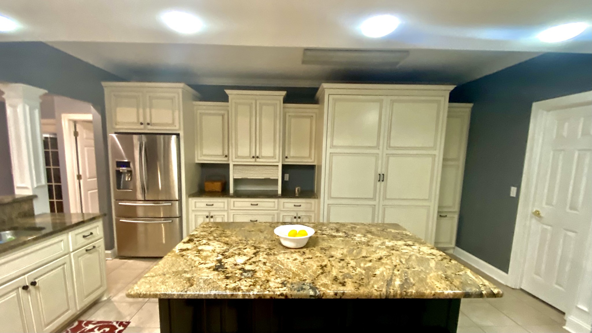 331 Duck River Road Manchester, TN 37355 - Photo 7 of 26 a view of kitchen island refrigerator sink and wooden floor