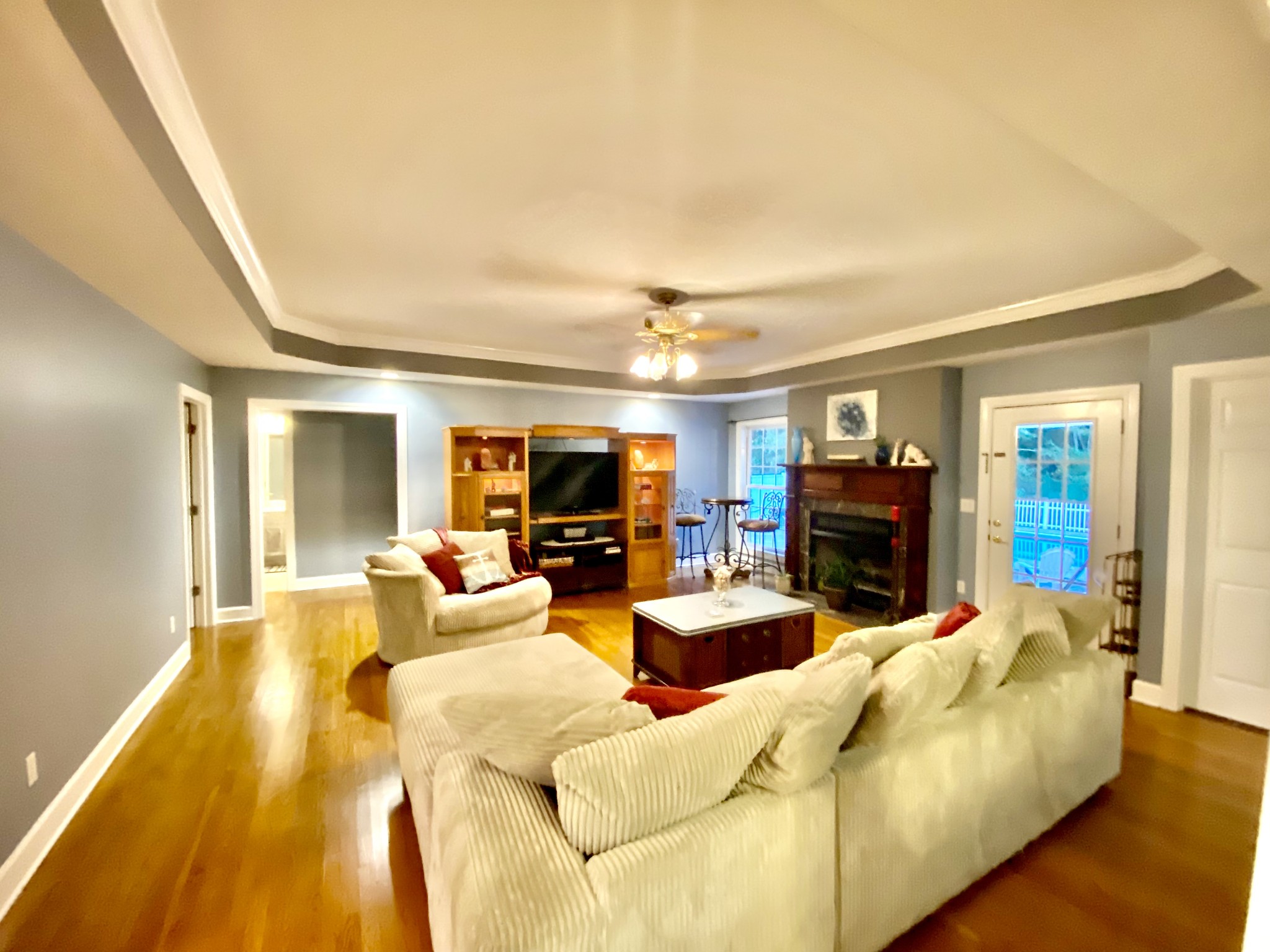 331 Duck River Road Manchester, TN 37355 - Photo 9 of 26 a living room with furniture a fireplace and a flat screen tv