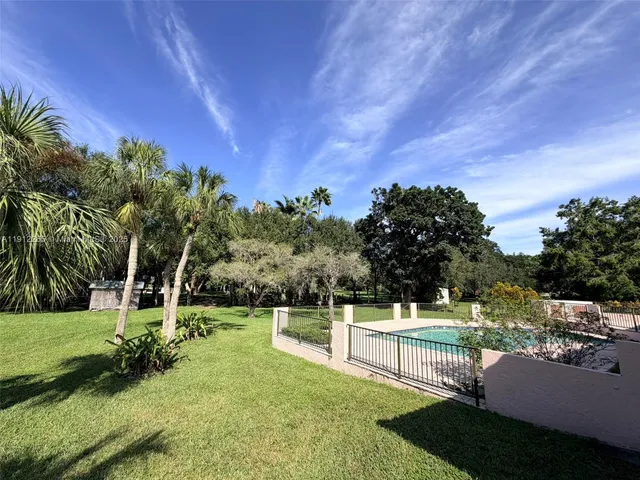 a view of a house with a big yard