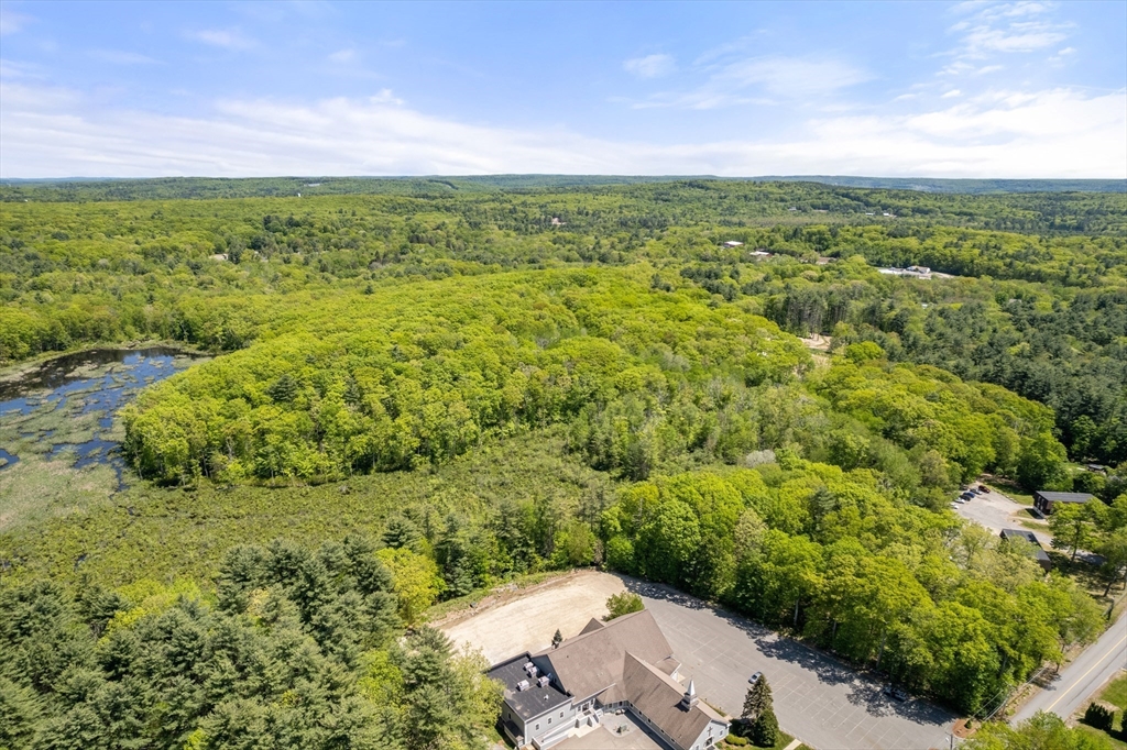 0 Hammond Hill Road Charlton, MA 01507 - Photo 18 of 24 a view of a city with lush green forest