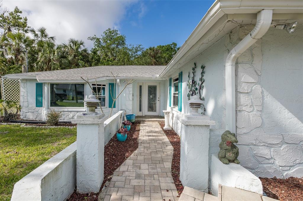 4573 Ontario Drive New Port Richey, FL 34652 - Photo 1 of 1 a front view of house with yard