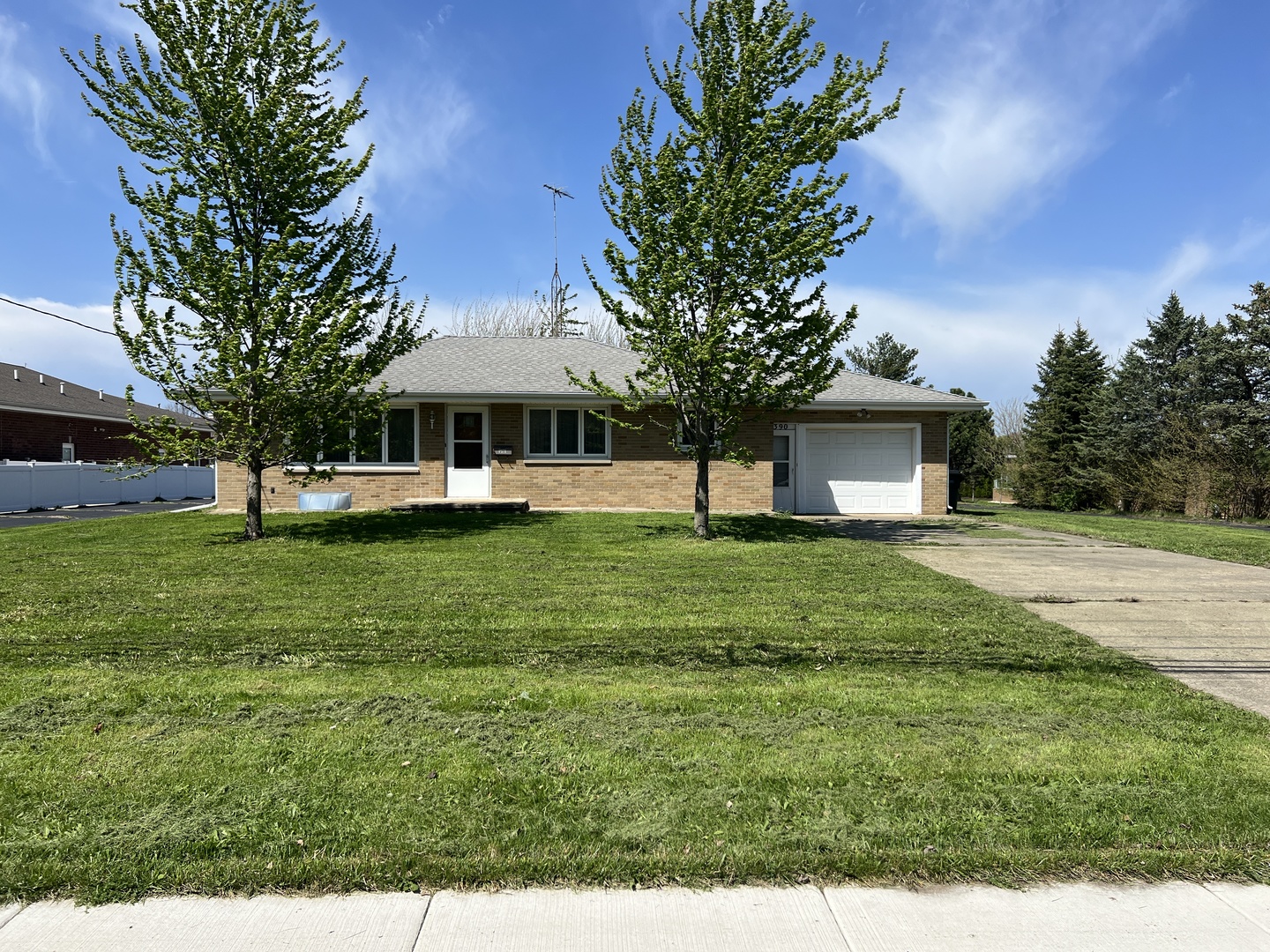 1390 Main Street Diamond, IL 60416 - Photo 1 of 1 a front view of a house with garden