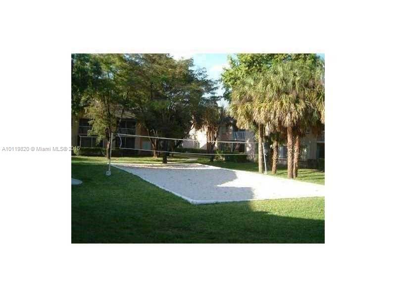 9079 Southwest 138th Place, Unit 9079 Miami, FL 33186 - Photo 28 of 34 a view of a park