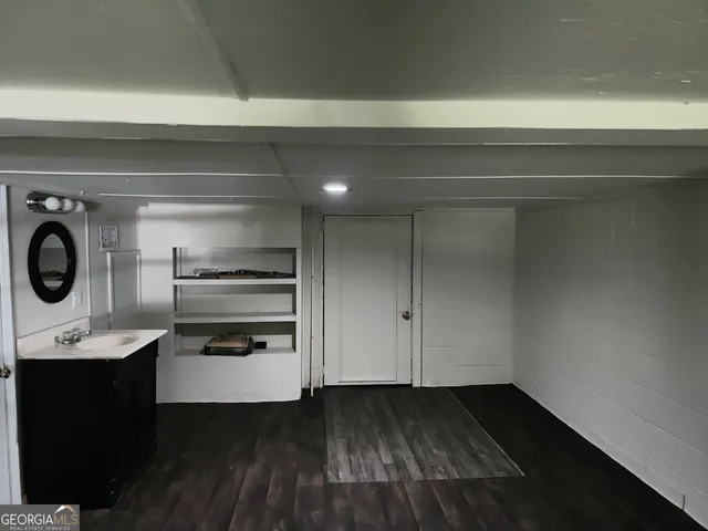 a white toilet sitting in a bathroom