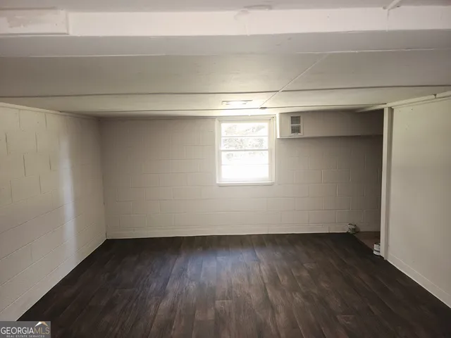 a bathroom with a sink a toilet and vanity