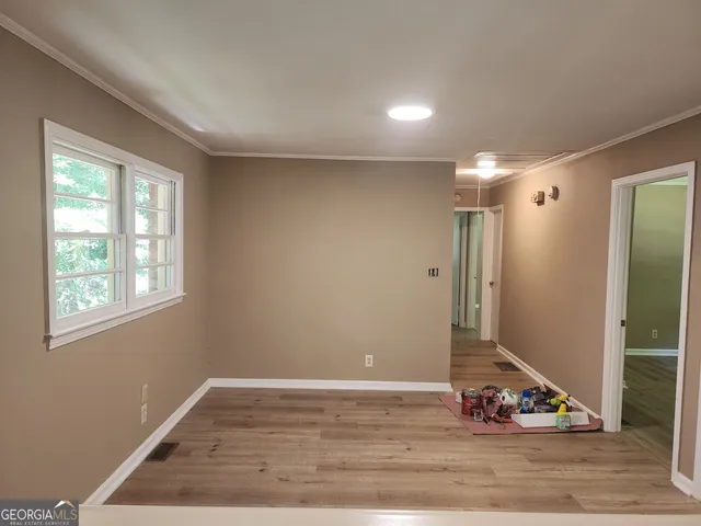 a kitchen with sink and window