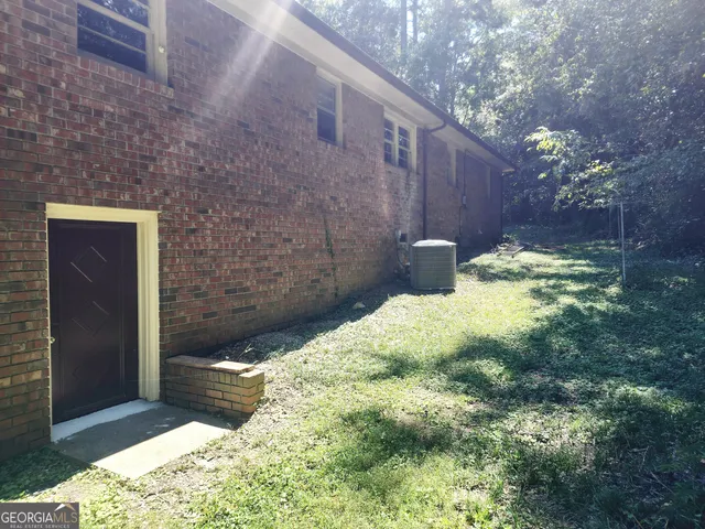 a bathroom with a sink and shower