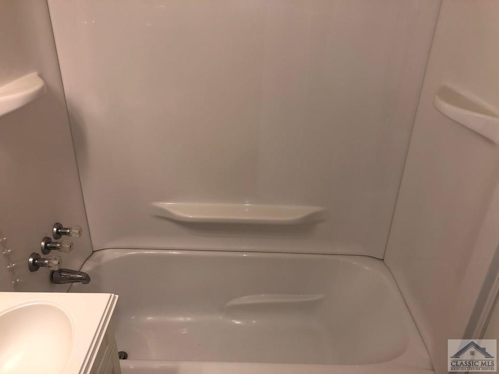 127 Pineview Drive Athens, GA 30606 - Photo 7 of 10 a bathroom with a sink and a toilet