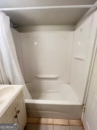 a bathroom with a bathtub