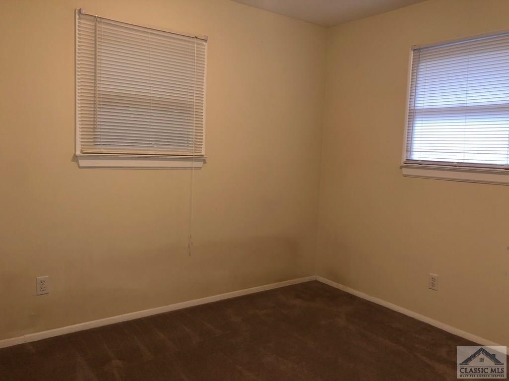 127 Pineview Drive Athens, GA 30606 - Photo 9 of 10 an empty room with a window