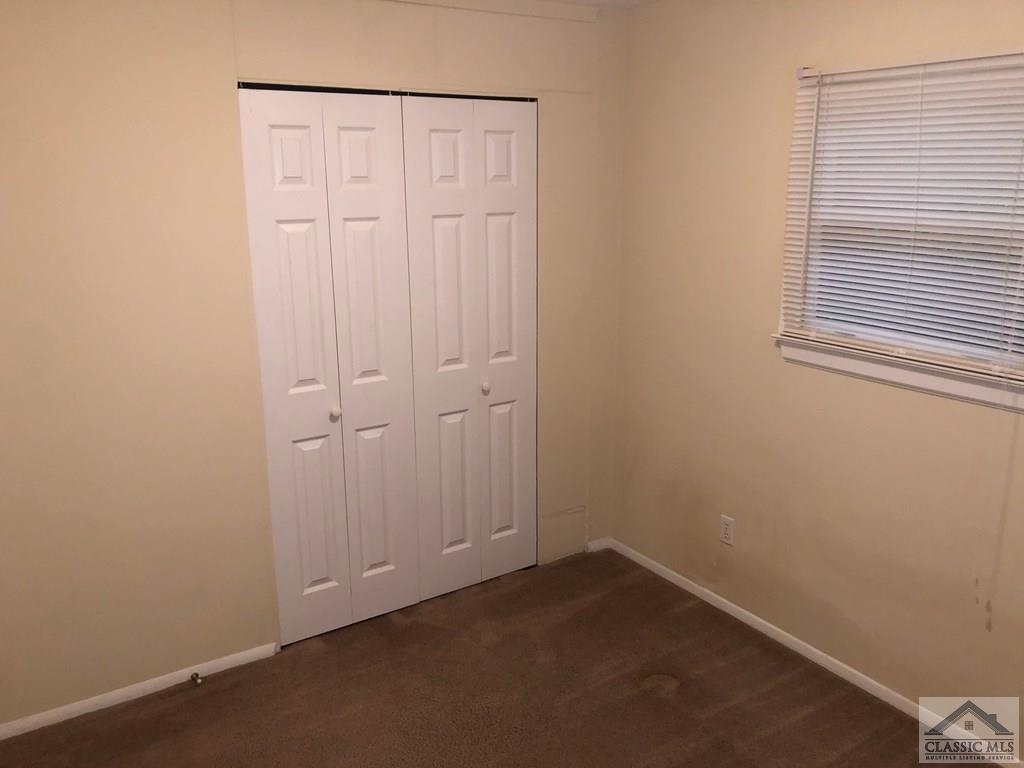 127 Pineview Drive Athens, GA 30606 - Photo 10 of 10 an empty room with a empty space