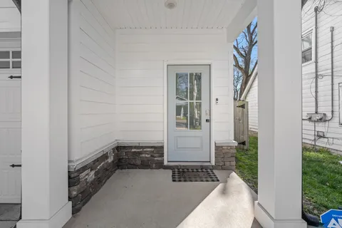 a room with a table and a mirror