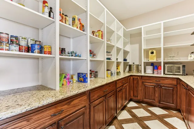 a kitchen with stainless steel appliances granite countertop a sink and dishwasher