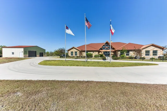 a view of swimming pool with outdoor seating