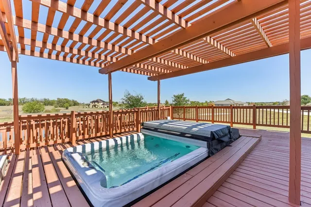 a balcony with wooden floor