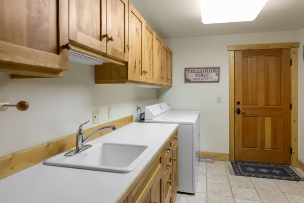 a kitchen with stainless steel appliances granite countertop a stove and cabinets