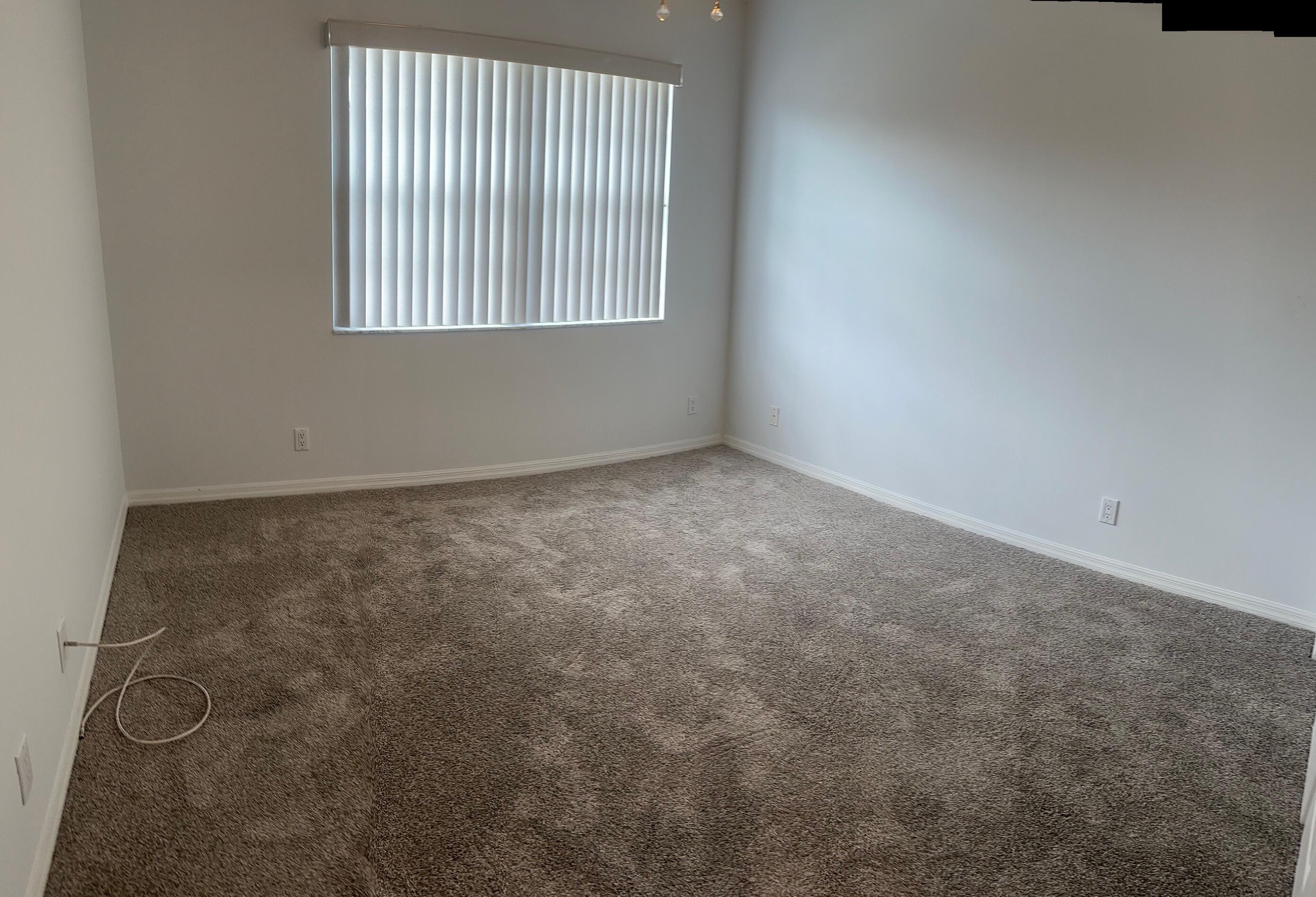 10720 Bexley Boulevard Boca Raton, FL 33428 - Photo 22 of 29 an empty room with a window